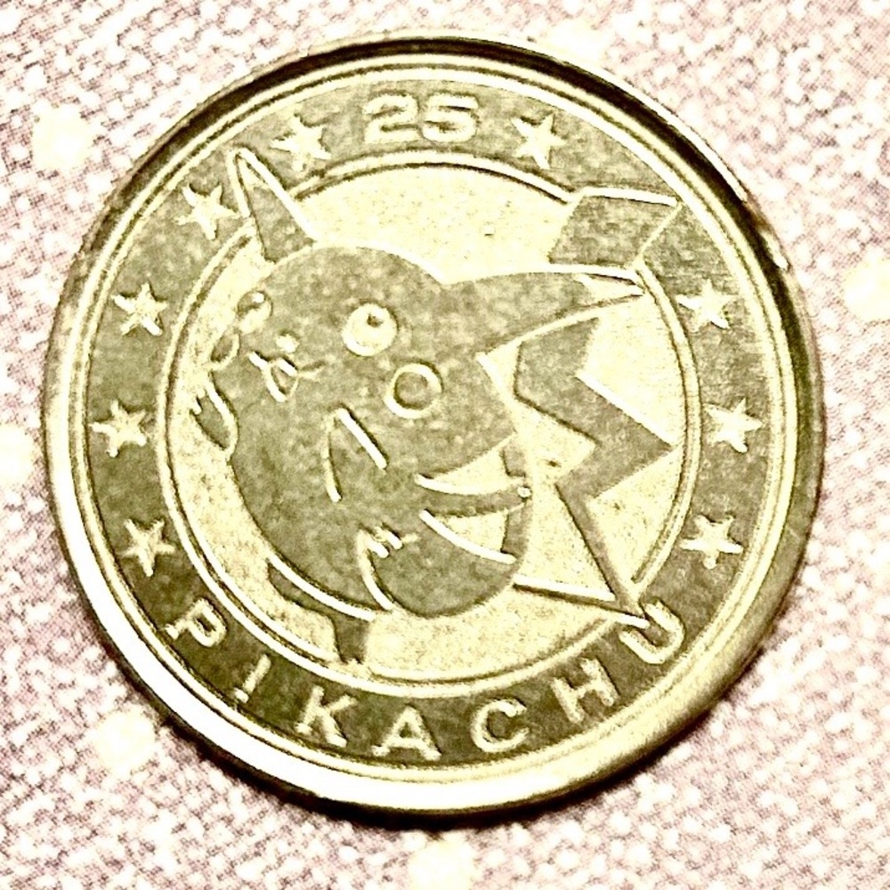 Pikachu 25th Anniversary Commemorative Coin
POKEMON 2000. NINTENDO 2000 WIZARD